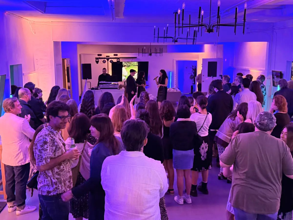 Live DJ performance at a premium Bat Mitzvah celebration in Pico-Robertson featuring vibrant purple event lighting.