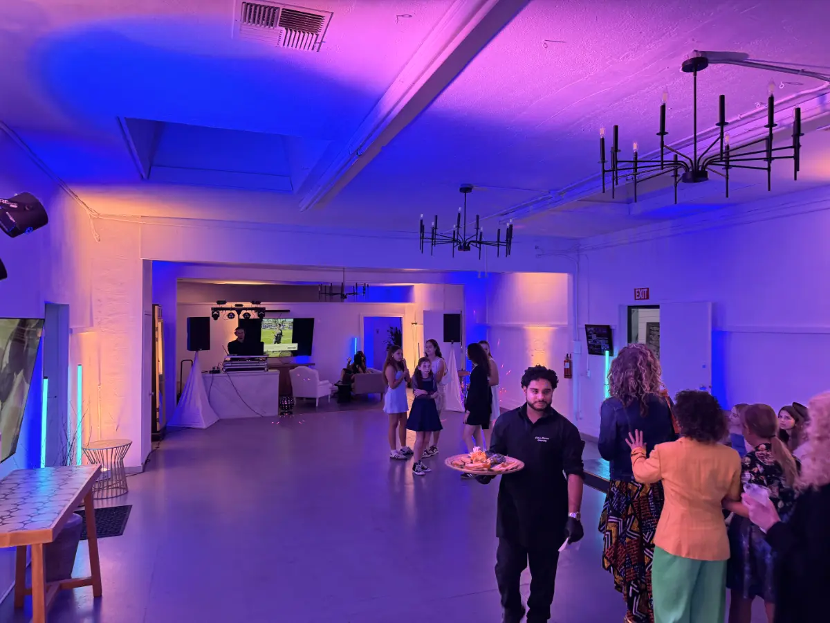 Industrial-chic party space for a Bar Mitzvah in Encino with catering setup.