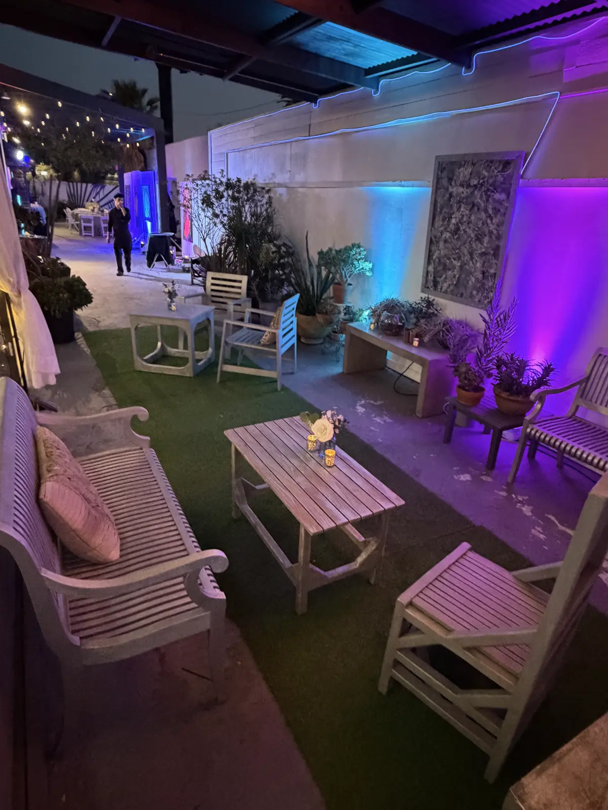 Outdoor lounge area at a Bar Mitzvah venue in Culver City with neon lighting.