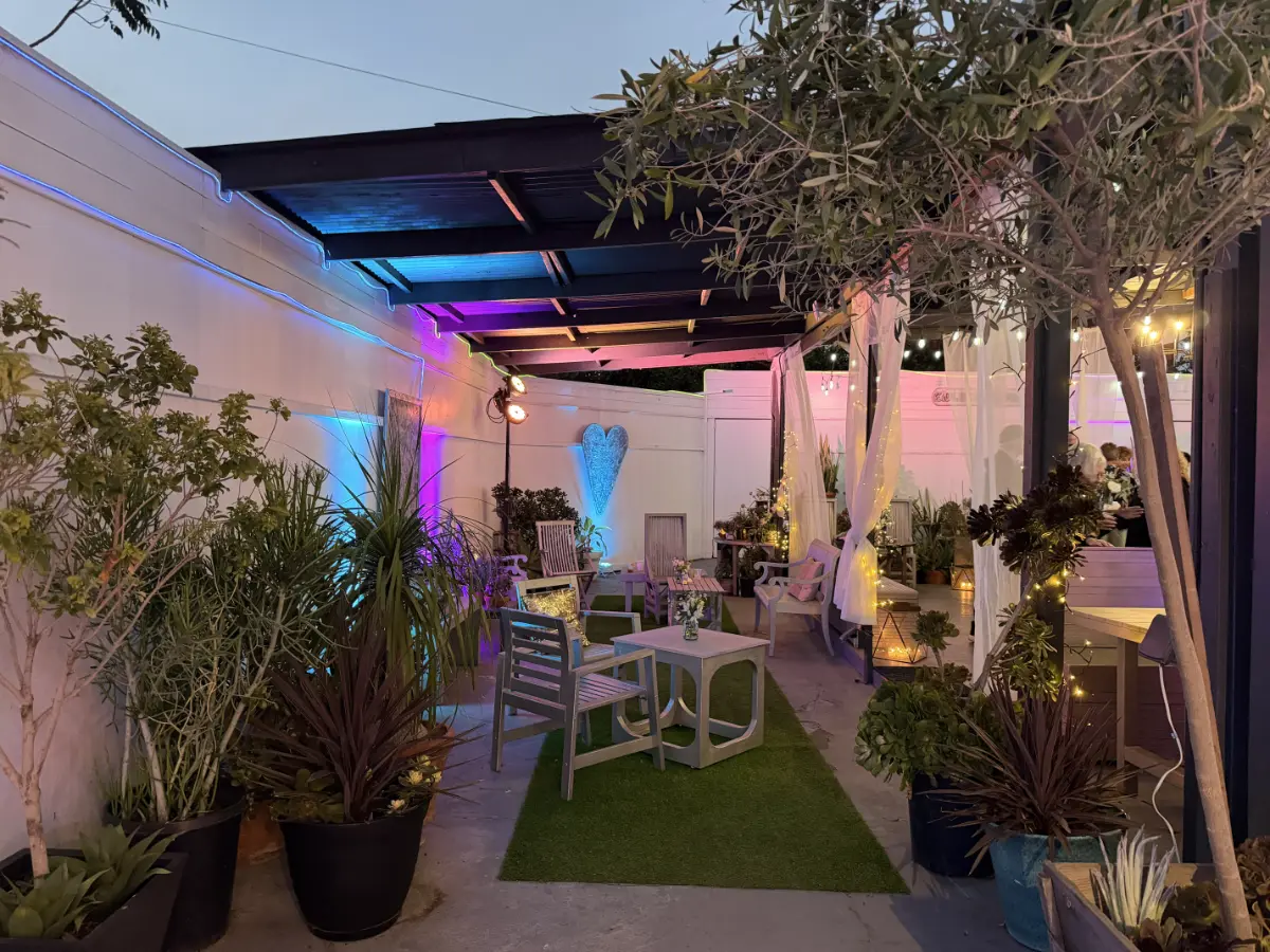 Outdoor lounge at a Bar Mitzvah event in Los Angeles with string lights.