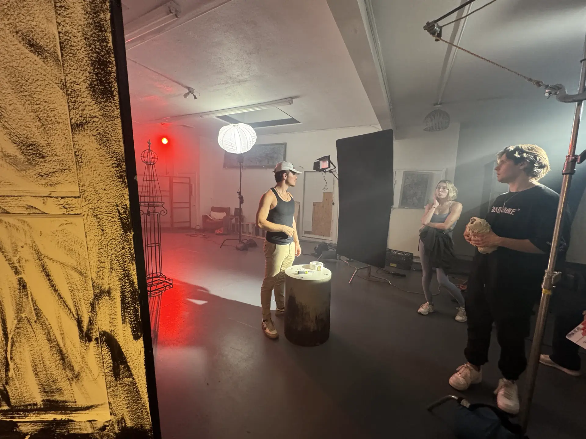 Creative team collaborating on a high-end shoot in a professional film production set Culver City premium studio environment.