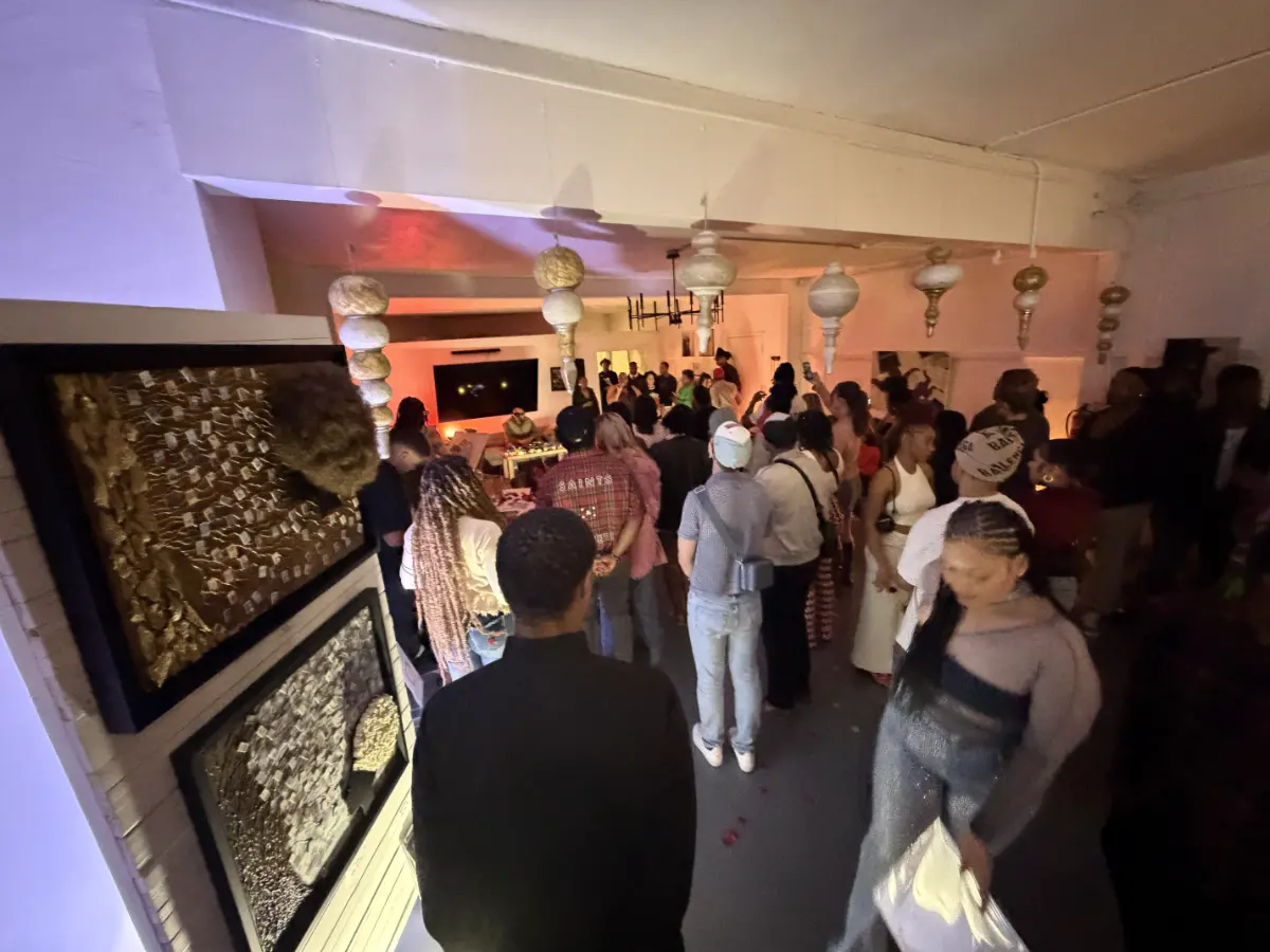 Art gallery gathering at a premium memorial event space in Rancho Park featuring atmospheric lighting and mixed media artwork for a life celebration.