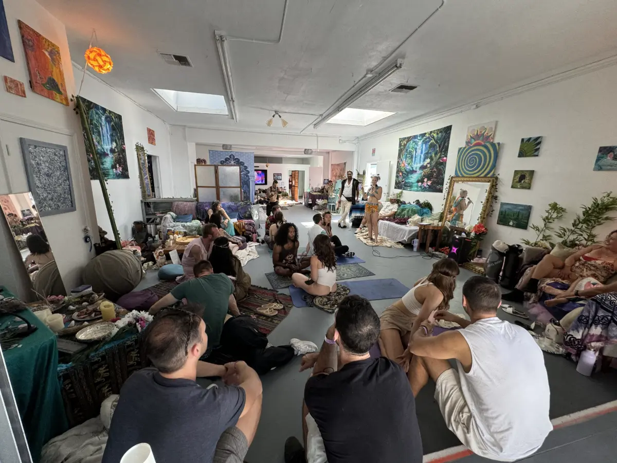Group seated together during a wellness session at Art and Space LA in Mid-City Los Angeles